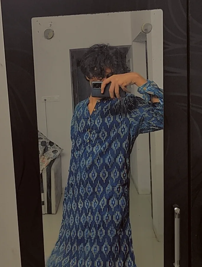Mirror portrait in a blue patterned kurta